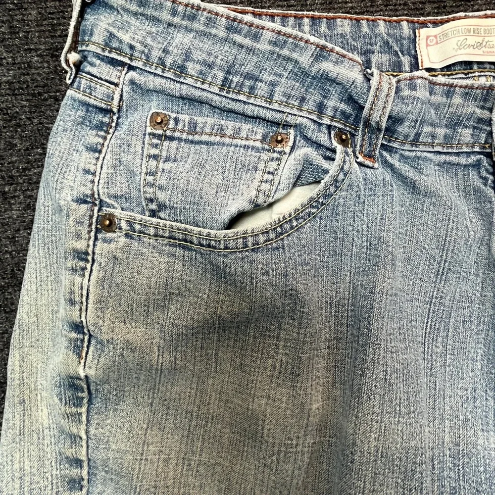 Levi Strauss Y2K Women 12 Light Wash Stretch Raw Hem Cut Off Denim Shorts Frayed